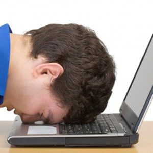 image of discouraged writer writing his college application essay